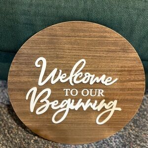 Welcome to Our Beginning Round Wood Sign - White Script